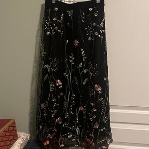 BloomChic Black Maxi Skirt with Floral Embroidery